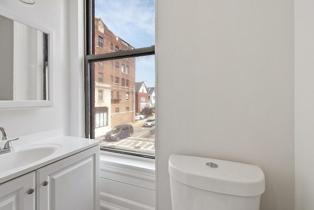 104 Pleasant St, Worcester, MA 01609 - half bathroom featuring vanity and toilet