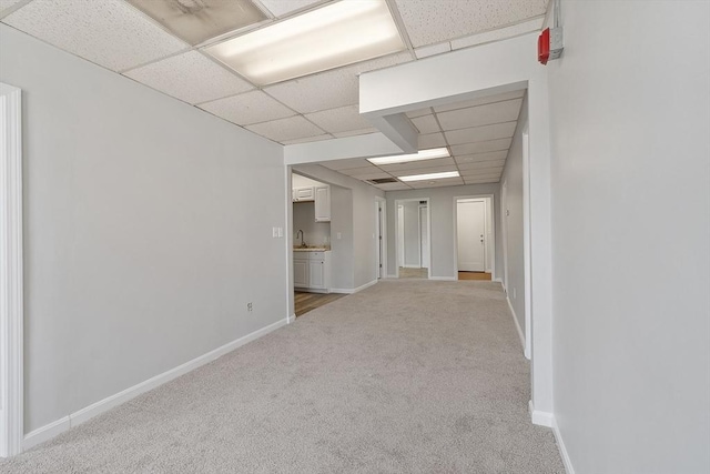 104 Pleasant St, Worcester, MA 01609 - unfurnished room featuring a drop ceiling and light colored carpet