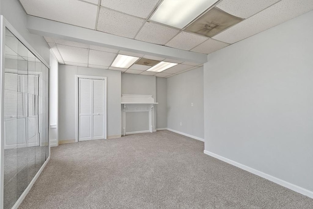 104 Pleasant St, Worcester, MA 01609 - basement featuring a drop ceiling and carpet