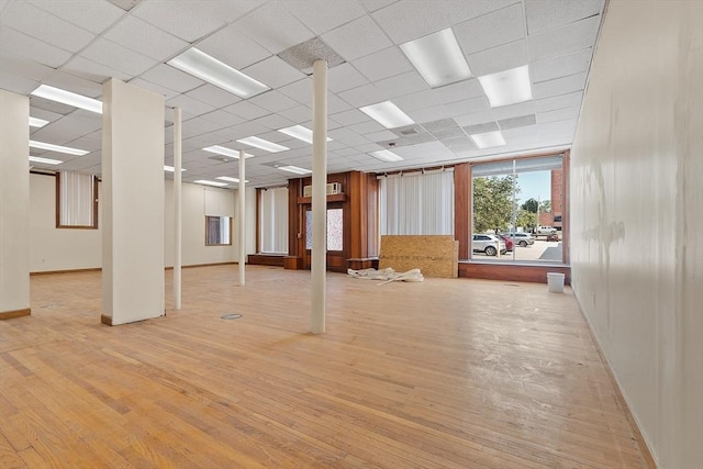 104 Pleasant St, Worcester, MA 01609 - spare room with light wood-style flooring and a drop ceiling