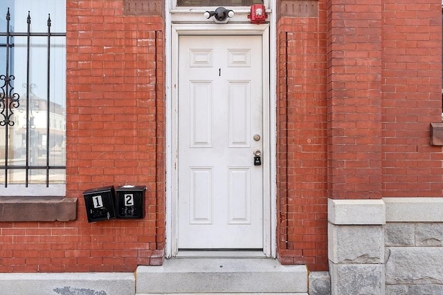 104 Pleasant St, Worcester, MA 01609 - property entrance featuring brick siding