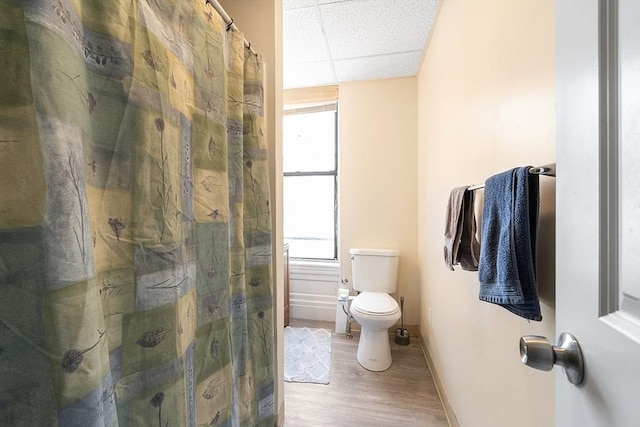 104 Pleasant St, Worcester, MA 01609 - bathroom with wood finished floors, a paneled ceiling, and curtained shower