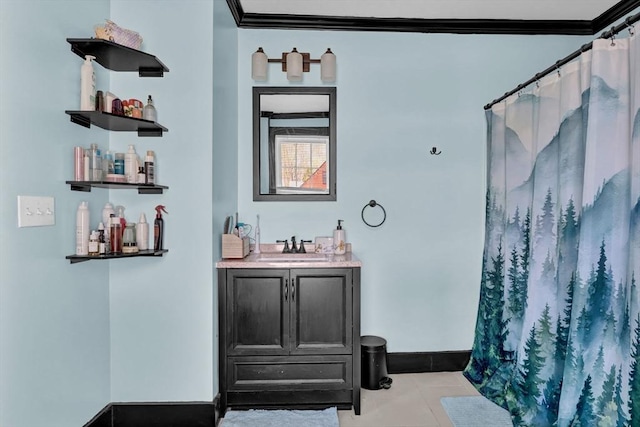 full bathroom with a shower with curtain, vanity, tile patterned flooring, crown molding, and baseboards