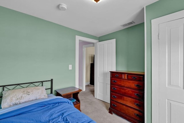 bedroom featuring carpet, baseboards, and visible vents