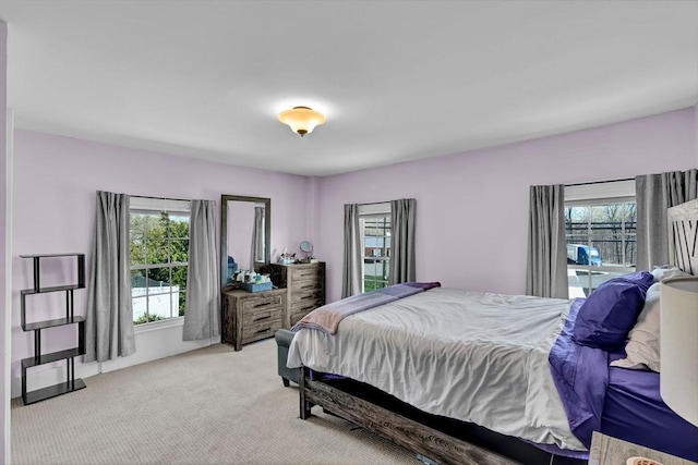 bedroom with light carpet