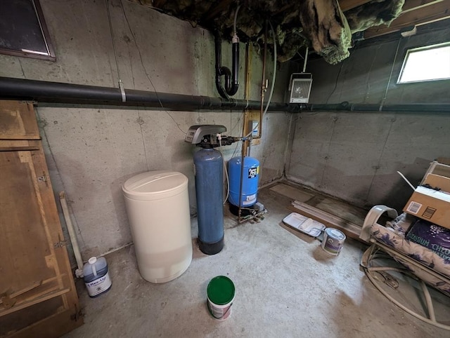 74 Ellis Rd, Southbridge, MA 01550 - below grade area with a water pressure tank and a water softener system