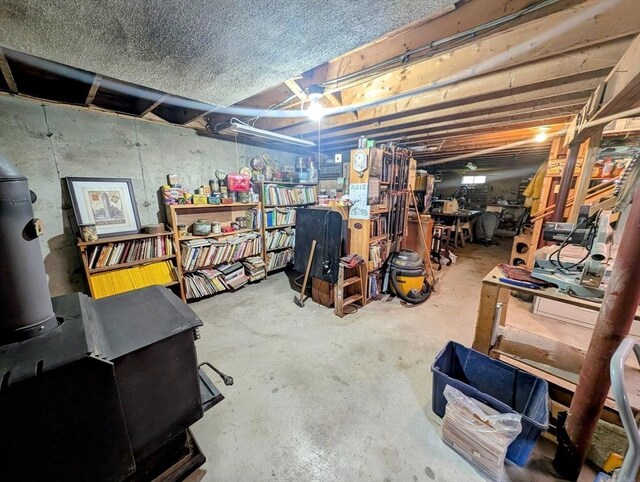 74 Ellis Rd, Southbridge, MA 01550 - unfinished basement with a workshop area