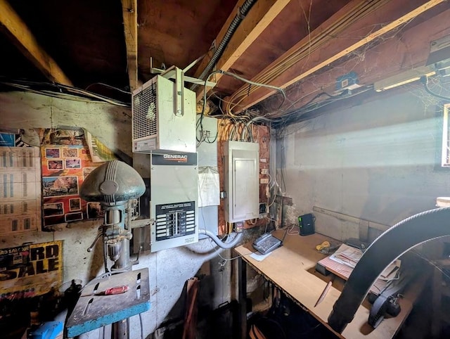 74 Ellis Rd, Southbridge, MA 01550 - unfinished below grade area with electric panel and a workshop area
