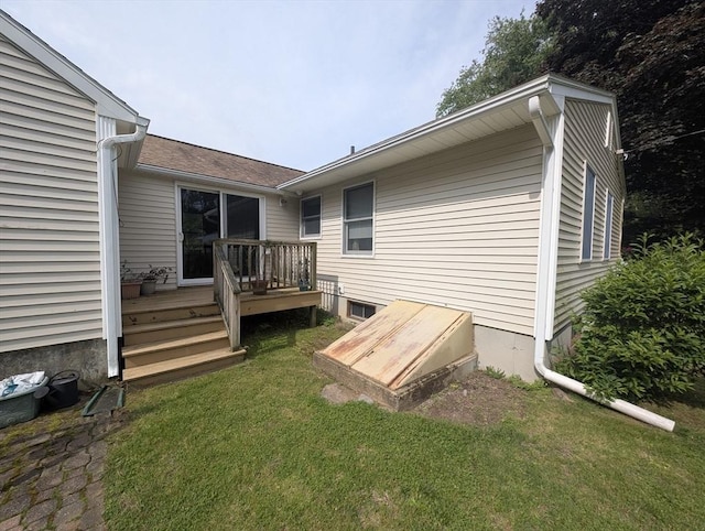 74 Ellis Rd, Southbridge, MA 01550 - back of house featuring a deck and a lawn