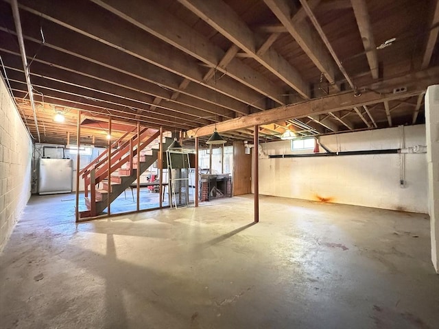 4 Norman Cir, Montague, MA 01376 - basement with stairs and refrigerator