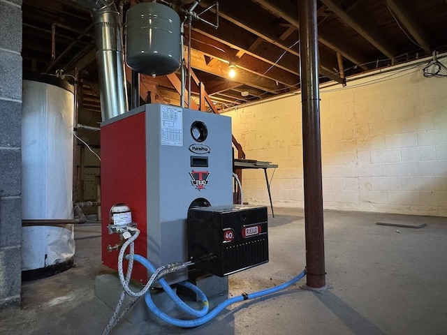 4 Norman Cir, Montague, MA 01376 - unfinished below grade area featuring gas water heater