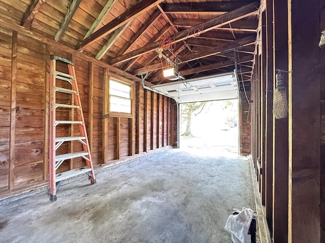 4 Norman Cir, Montague, MA 01376 - garage featuring a garage door opener