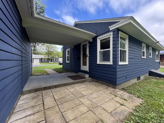 4 Norman Cir, Montague, MA 01376 - view of property exterior with entry steps and a patio