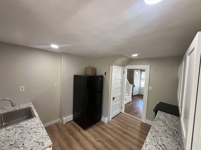59 Carson Ave Unit 59, Clarksburg, MA 01247 - kitchen featuring freestanding refrigerator, a sink, light wood-style flooring, light countertops, and recessed lighting