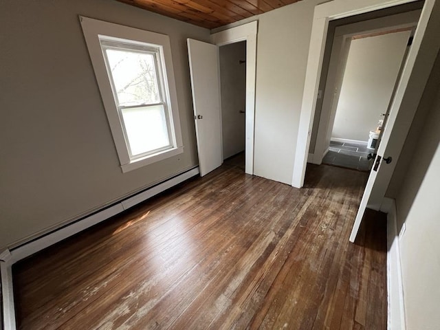 59 Carson Ave Unit 59, Clarksburg, MA 01247 - unfurnished bedroom featuring dark wood finished floors, a baseboard heating unit, and wood ceiling