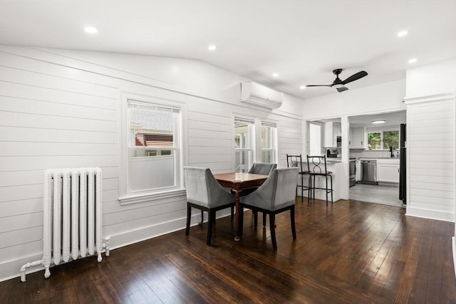 19 Arlington Rd, Dedham, MA 02026 - dining space featuring radiator, a wall unit AC, ceiling fan, dark wood-style flooring, and recessed lighting
