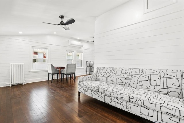 19 Arlington Rd, Dedham, MA 02026 - living area featuring radiator heating unit, a wall mounted AC, lofted ceiling, a ceiling fan, and hardwood / wood-style flooring