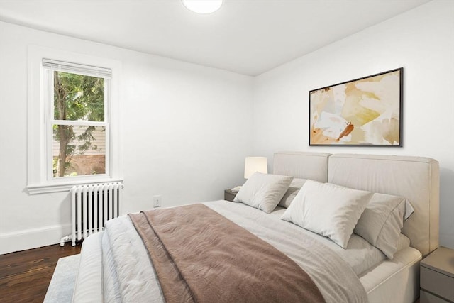 19 Arlington Rd, Dedham, MA 02026 - bedroom featuring radiator and wood finished floors