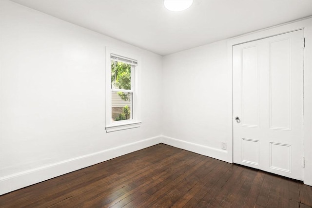 19 Arlington Rd, Dedham, MA 02026 - spare room featuring baseboards and dark wood finished floors