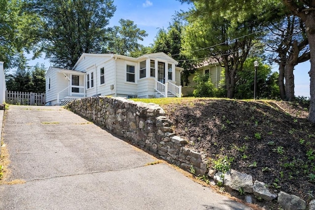 19 Arlington Rd, Dedham, MA 02026 - view of front of home featuring driveway and entry steps