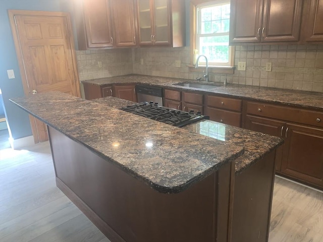 205 Gardner Rd, Hubbardston, MA 01452 - kitchen featuring dishwasher, light wood finished floors, a center island, and dark stone countertops