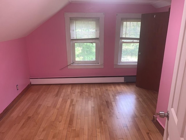 205 Gardner Rd, Hubbardston, MA 01452 - bonus room featuring vaulted ceiling, baseboard heating, and light wood-style flooring