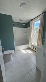 486-488 E Merrimack St, Lowell, MA 01852 - bathroom with a walk in shower, toilet, tile patterned floors, and vanity