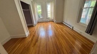486-488 E Merrimack St, Lowell, MA 01852 - unfurnished room with plenty of natural light, baseboard heating, and baseboards