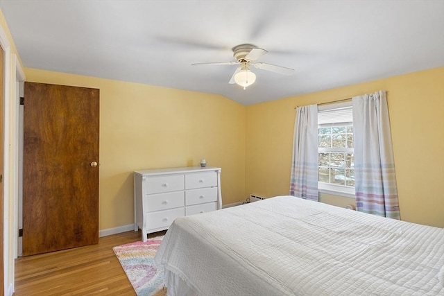 bedroom featuring ceiling fan and light hardwood / wood-style flooring