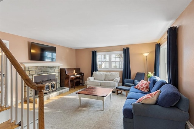 living room featuring a fireplace