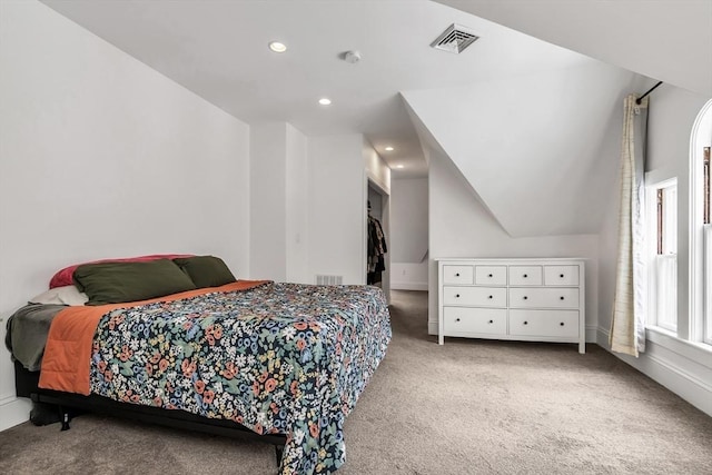 bedroom featuring carpet floors, visible vents, and recessed lighting