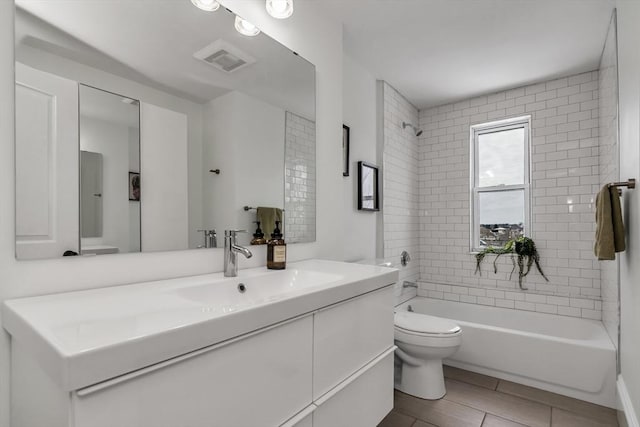 full bath with toilet, tub / shower combination, vanity, and visible vents