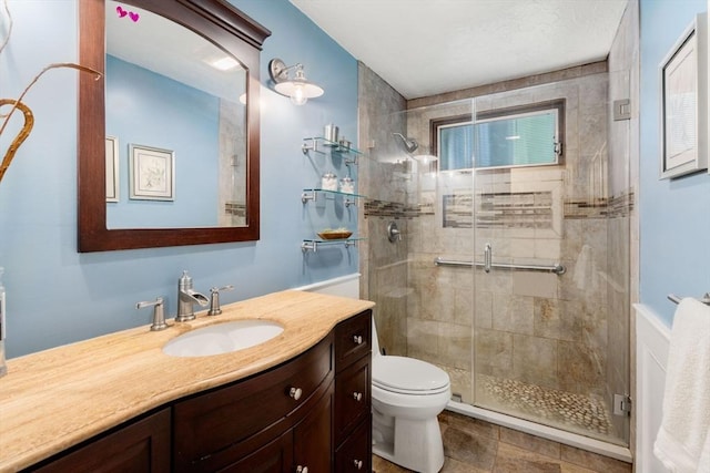 198 Edge Hill Rd, Sharon, MA 02067 - bathroom featuring vanity, toilet, and a shower stall