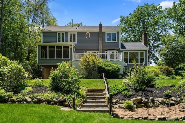 198 Edge Hill Rd, Sharon, MA 02067 - rear view of property featuring a chimney, a deck, a yard, and stairs