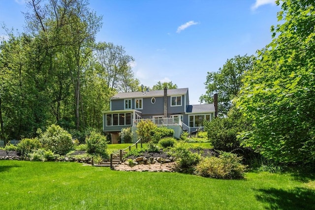 198 Edge Hill Rd, Sharon, MA 02067 - rear view of house featuring a yard, a chimney, a deck, and stairway