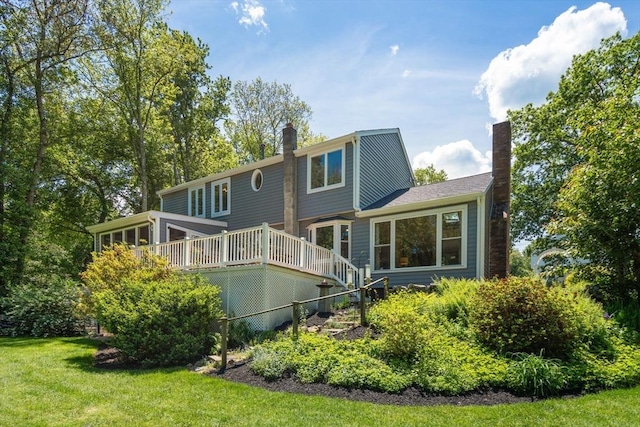 198 Edge Hill Rd, Sharon, MA 02067 - rear view of house featuring a chimney, a deck, and a yard