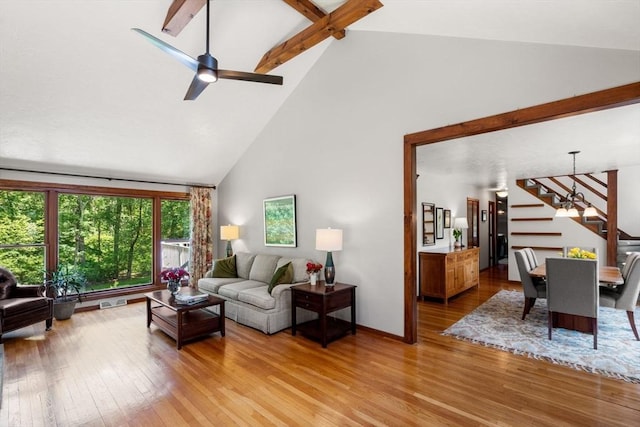 198 Edge Hill Rd, Sharon, MA 02067 - living area with high vaulted ceiling, stairway, light wood-style flooring, beam ceiling, and ceiling fan