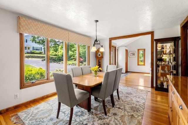 198 Edge Hill Rd, Sharon, MA 02067 - dining area featuring healthy amount of natural light, baseboards, and light wood-type flooring