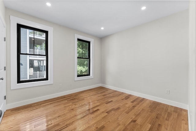 empty room with light wood-type flooring