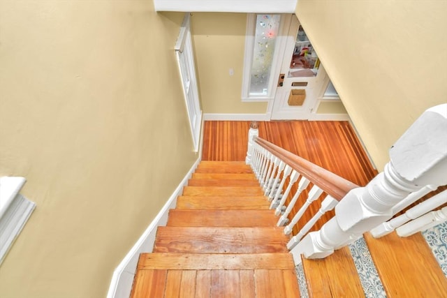 staircase with baseboards