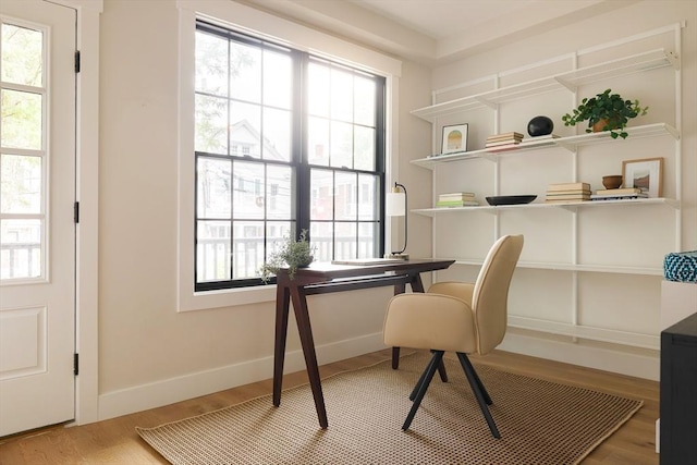 16 Plymouth St Unit 16, Arlington, MA 02476 - home office featuring healthy amount of natural light and wood finished floors