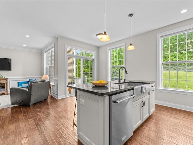 79 Townsend Blvd Unit 79, Westborough, MA 01581 - kitchen featuring dishwasher, dark countertops, open floor plan, healthy amount of natural light, and crown molding