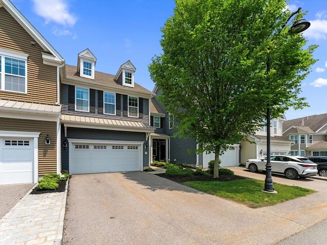 79 Townsend Blvd Unit 79, Westborough, MA 01581 - townhome / multi-family property with a garage, driveway, a standing seam roof, and a metal roof