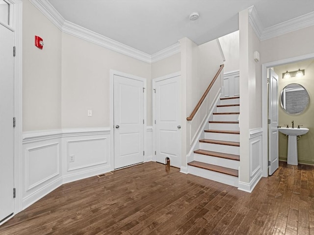 79 Townsend Blvd Unit 79, Westborough, MA 01581 - entrance foyer featuring crown molding, hardwood / wood-style flooring, stairs, and a wainscoted wall