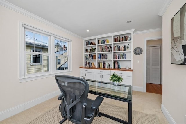 carpeted office space featuring crown molding