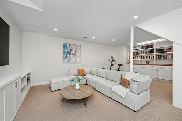 living room featuring light carpet