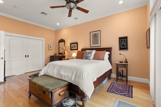 50 Telpgraph St, Boston, MA 02127 - bedroom featuring light wood-style floors, recessed lighting, crown molding, a closet, and a ceiling fan