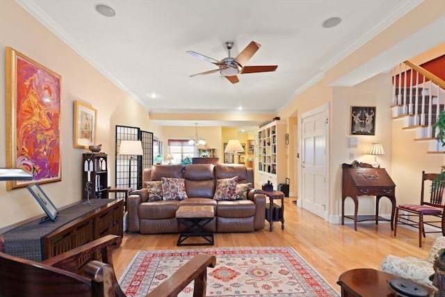 50 Telpgraph St, Boston, MA 02127 - living room with ceiling fan, light wood-type flooring, stairs, and crown molding