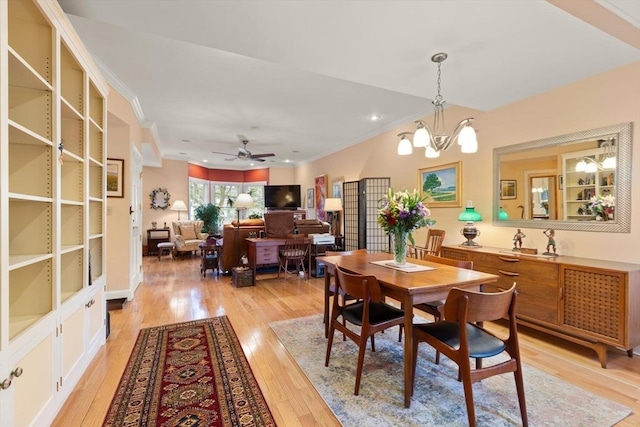 50 Telpgraph St, Boston, MA 02127 - dining area featuring light wood finished floors, a chandelier, crown molding, and ceiling fan