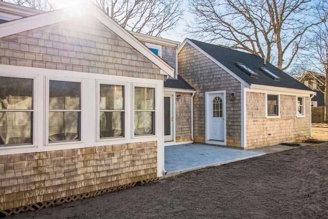 back of house with a patio area